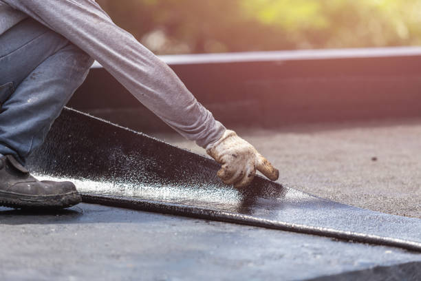Professional Waterproofing technician working in Windsor, IL